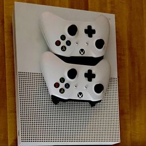 Xbox one S with games and charging stand